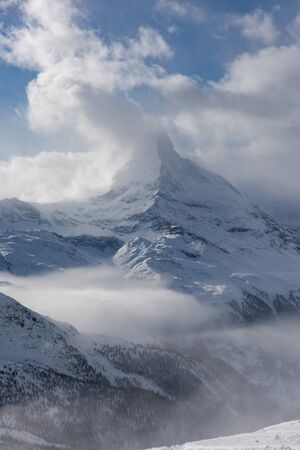 mountain matterhorn zermatt switzerland  with fresh snow on beautiful winter dayの写真素材