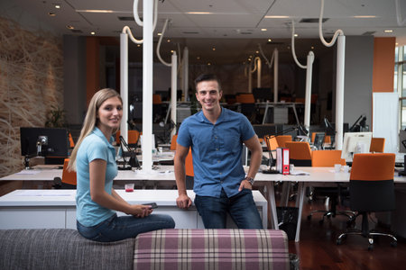Portrait of startup business couple in a modern office