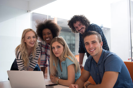 Multiethnic startup business team on meeting in modern bright office interior brainstorming, working...
