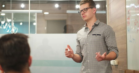 portrait of young businessman at startup officeの写真素材