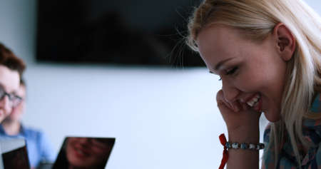 tracking shot of  Young Woman In A Startup Officeの写真素材