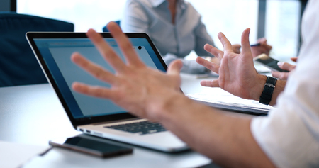 business people having meeting in bright office making plans for businessの写真素材