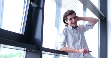 portrait of young businessman at startup office