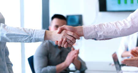 Business Partner Shake Hands on meetinig in modern office buildingの写真素材