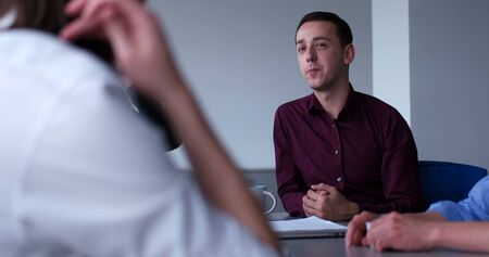 Group of business people discussing business plan  in the officeの写真素材