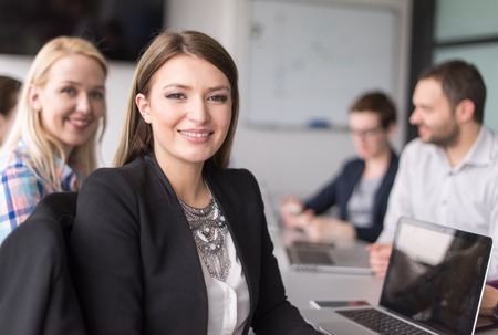 Group of business people discussing business plan  in the officeの写真素材