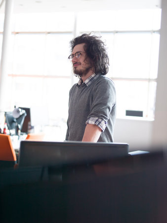 portrait of young businessman at startup officeの写真素材
