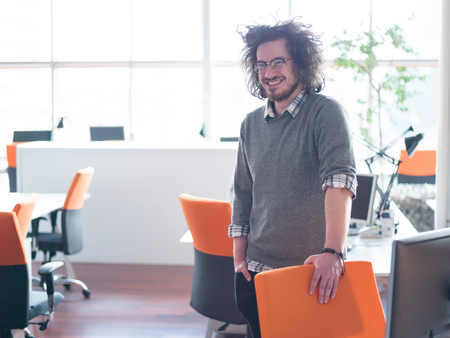 portrait of young businessman at startup officeの写真素材