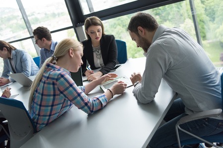 Group of business people discussing business plan  in the officeの写真素材