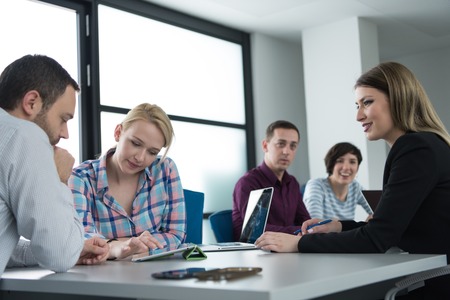 Group of business people discussing business plan  in the officeの写真素材