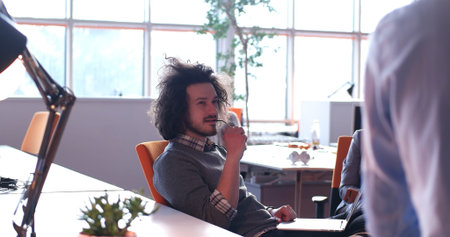 Young Entrepreneur Freelancer Working Using A Laptop In Coworking space