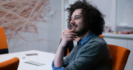 Group of a young business people discussing business plan at modern startup office buildingの写真素材