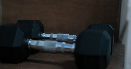 black Hand weights at the gymの写真素材