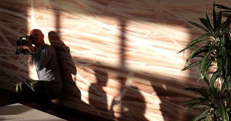 Photographer taking picture in luxuary villaの写真素材