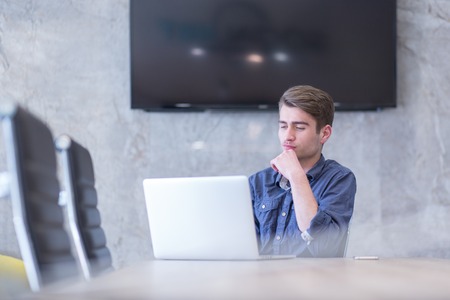 Young Entrepreneur Freelancer Working Using A Laptop In Coworking spaceの写真素材