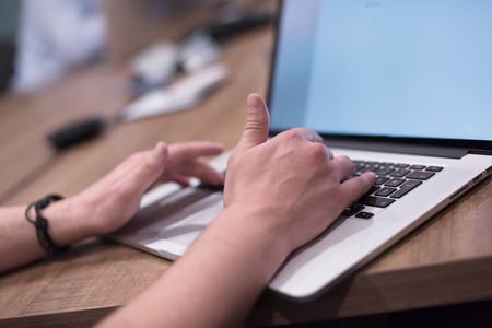 Group of a young business people discussing business plan at modern startup office buildingの写真素材