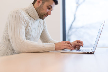 Young Entrepreneur Freelancer Working Using A Laptop In Coworking spaceの写真素材