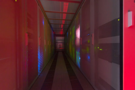 panel modern communication equipment with light from the display at data center in the server room