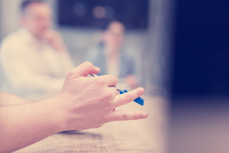 young businessman hand using pen closeup shotの写真素材