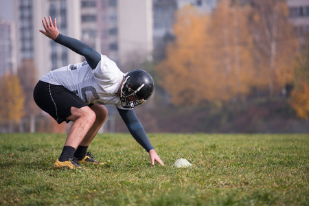 young american football player in action during the training at fieldの写真素材