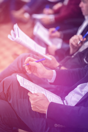 Young people taking notes on education training  business seminar at modern conference roomの写真素材