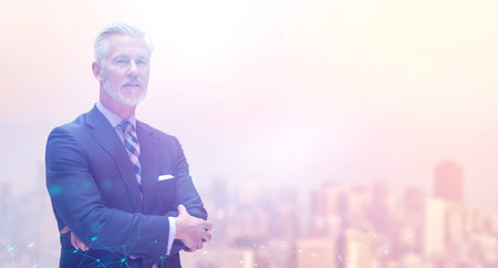 Portrait of senior businessman in front of big modern city