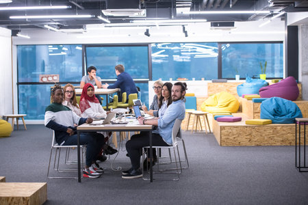 Multiethnic startup business team on meeting in modern bright office interior brainstorming, working...