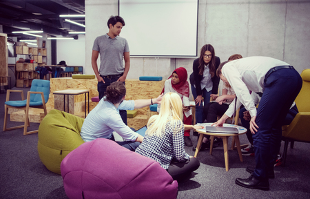 Multiethnic startup business team on meeting in modern bright office interior brainstormingの写真素材