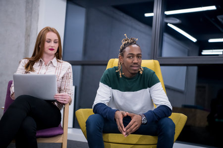 Multiethnic startup business team on meeting in modern bright office interior brainstorming, working...