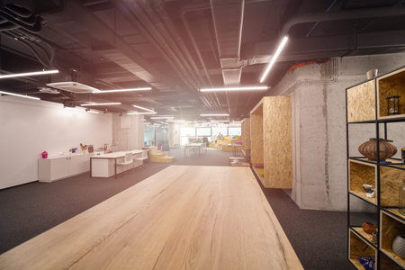 young software developers enjoying break in relaxation area of Modern sunny bright Open Plan Office