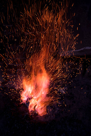 Traditional blacksmith furnace with burning fire
Burning fire in furnace at forge, workshop....