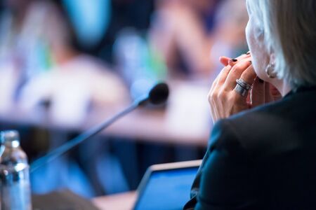 close up of businesswoman at business conference room with public giving presentations. Audience at the conference hall. Entrepreneurship clubの写真素材