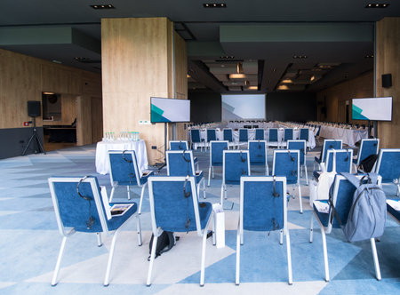 interior of big modern conference room before starting a business seminar