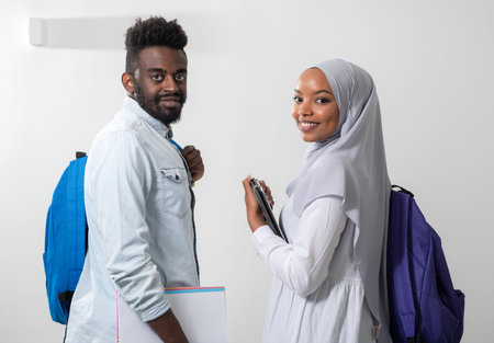 young african students couple walking woman wearing traditional sudan muslim hijab clothes business...