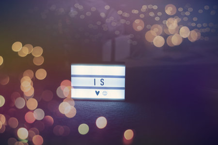 new year and christmas office party close up details food preparing and eating drinks and gifts authentic local startup business teamの写真素材