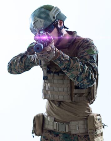 modern warfare american marines soldier aiming  on laseer sight optics  in combat position and searching for target isolated on white backgroundの写真素材