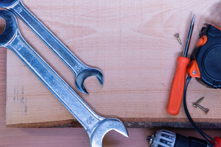 set of hand working tools on wooden background The concept of tools and repair work
