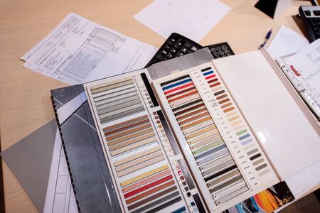 Architect & Interior designer working table with equipment and material sample/ home renovation conceptの写真素材