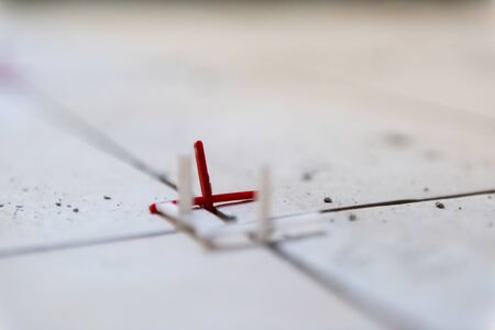 Ceramic tiles and tools for tiler  ceramic tiles installation  Home improvement, renovation   ceramic tile adhesive, mortar, levelの写真素材