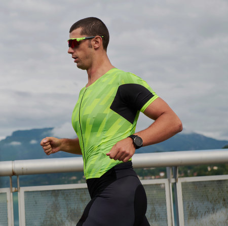 triathlon athlete running on street