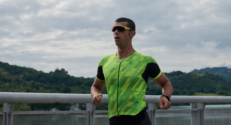 triathlon athlete running on street