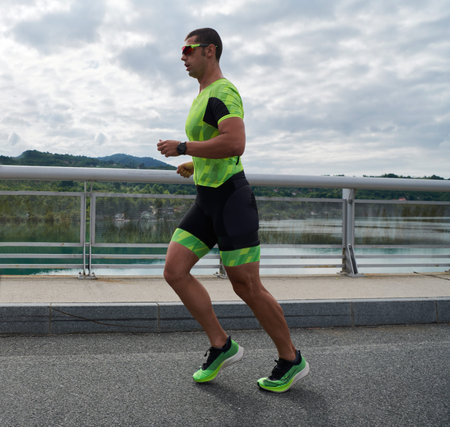 triathlon athlete running on street