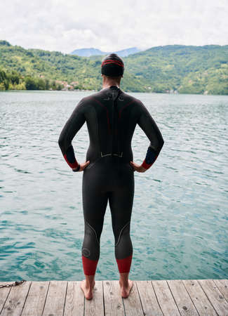 triathlete swimmer portrait wearing wetsuit on trainingの写真素材