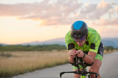 triathlon athlete riding a bikeの写真素材
