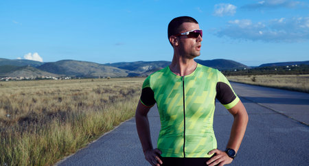 triathlon athlete resting and setting smartwatch