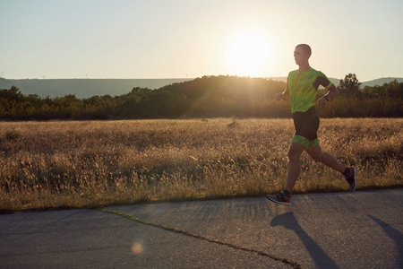 triathlon athlete running on morning trainig