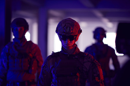 soldier squad team walking in urban environment colored lightisの写真素材