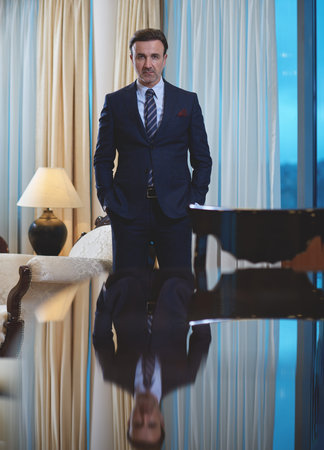 corporate business man portrait at luxury office