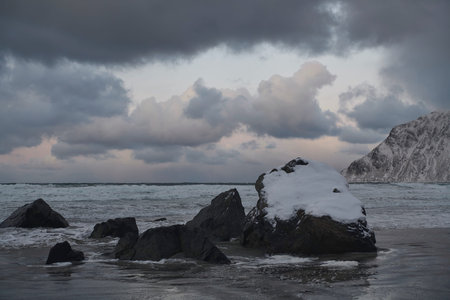 norway coast in winter with snow bad cloudy weather