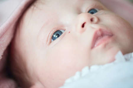 happy newborn little baby smillingの写真素材